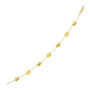 14k Yellow Gold Bracelet with Textured and Polished Pebble Stations (6.35 mm)